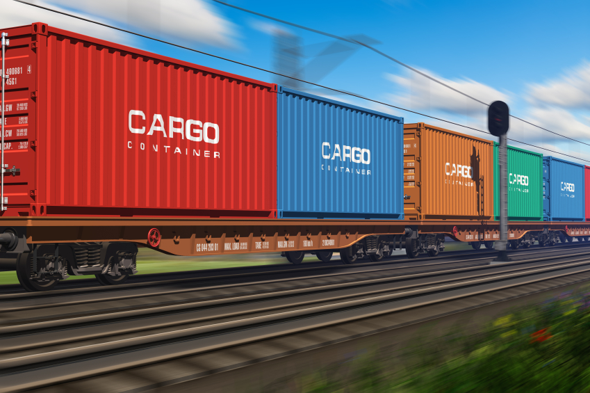 Freight train with cargo containers passing by